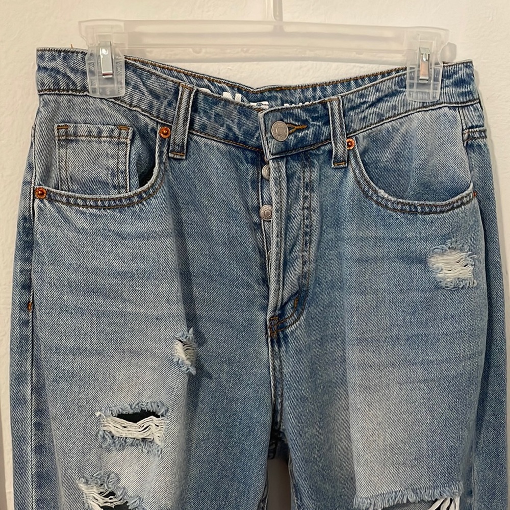 Woman riped jeans